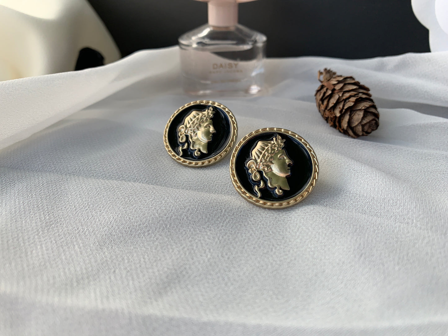 Romanesque statue earring