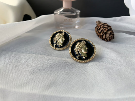 Romanesque statue earring